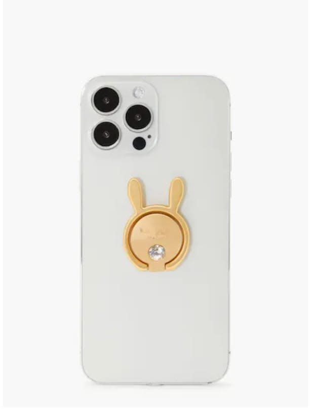 <p>Why settle for an ordinary phone stand? This bunny ring attaches to any smartphone. When not in use, the ring snaps up around the adorable bunny. </p><p><em><a href="https://go.skimresources.com?id=113896X1572730&xs=1&url=https%3A%2F%2Fwww.katespade.com%2Fproducts%2Flunar-new-year-bunny-ring-stand%2FKA094.html&sref=parade.com%2Fshopping%2Feaster-gifts-teens" rel="noopener" target="_blank" data-ylk="slk:Lunar New Year Bunny Ring Stand, $32 at Kate Spade;elm:context_link;itc:0;sec:content-canvas" class="link ">Lunar New Year Bunny Ring Stand, $32 at Kate Spade</a></em></p><p>Kate Spade</p>