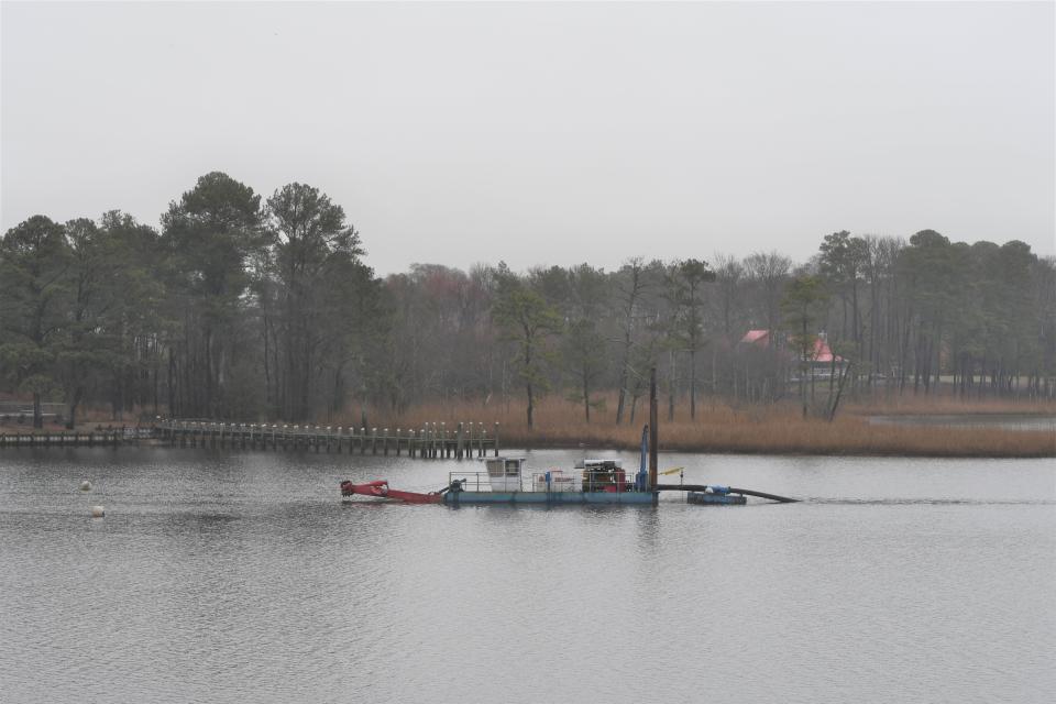 A dredging boat in the Indian River off River Drive in Millsboro March 5, 2024.