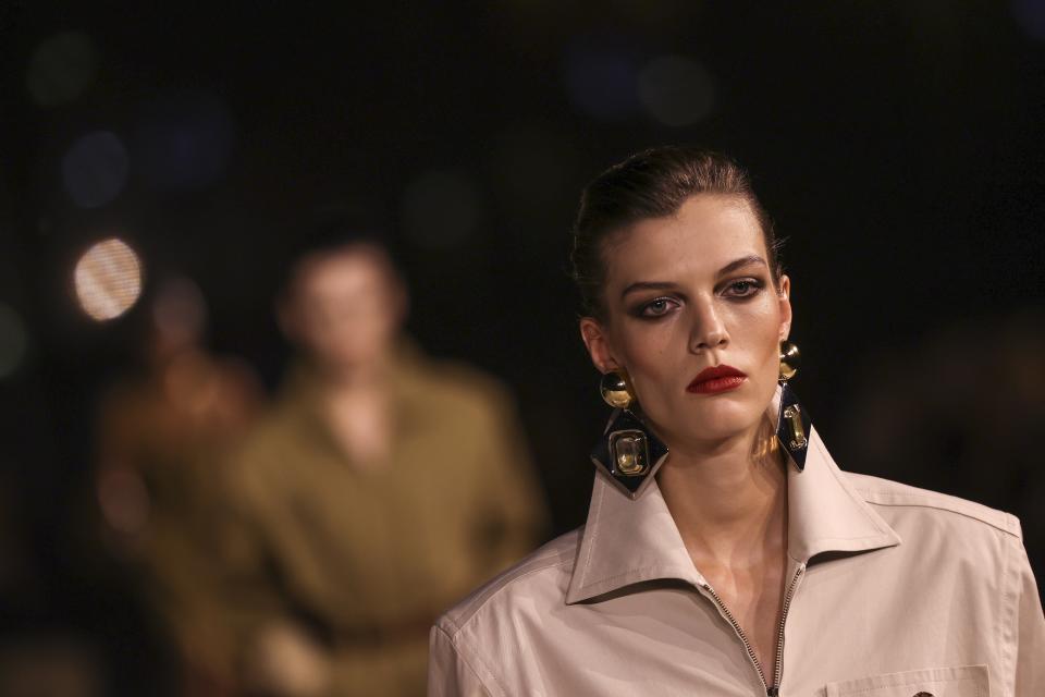 A model wears a creation for the Yves Saint Laurent Spring/Summer 2024 womenswear fashion collection presented Tuesday, Sept. 26, 2023 in Paris. (AP Photo/Vianney Le Caer)