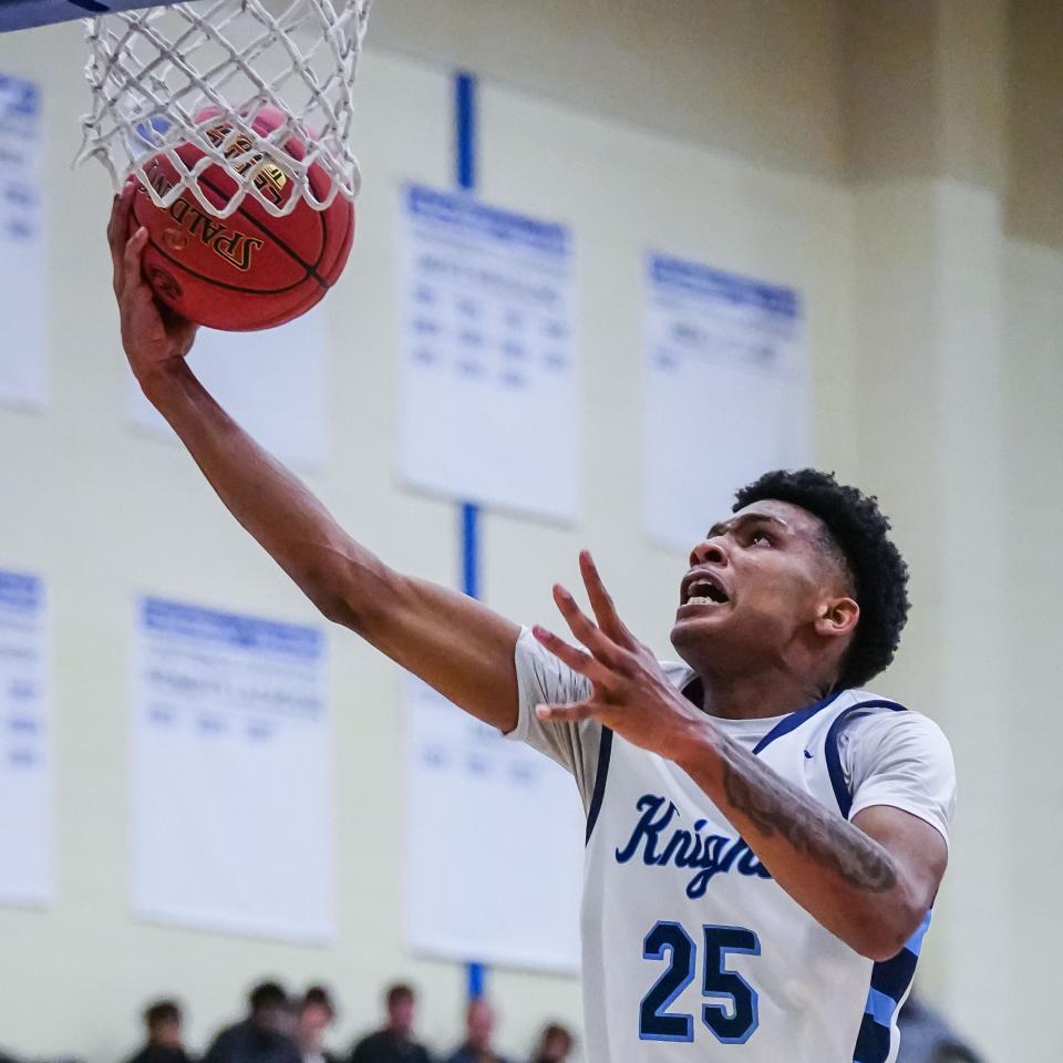 Nicolet's Davion Hannah (25) drives to the hoop against St. Thomas More during the Rick Majerus Wisconsin Basketball Yearbook Shootout at Concordia University in Mequon on Friday, Dec. 29, 2023.