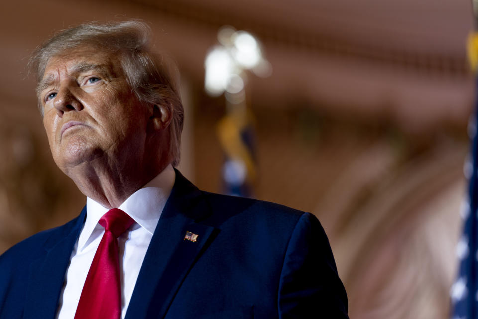 FILE - Former President Donald Trump announces he is running for president for the third time as he pauses while speaking at Mar-a-Lago in Palm Beach, Fla., Nov. 15, 2022. Lawyers for Donald Trump were in court Friday, Dec. 9, for sealed arguments as part of the ongoing investigation into the presence of classified information at the former president's Florida estate. (AP Photo/Andrew Harnik, File)