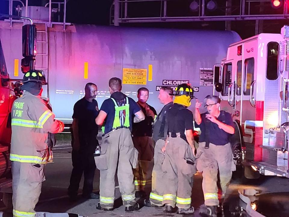 First responders from several metro-east agencies are shown at the site of a crash involving a Union Pacific train and a pickup truck early Saturday morning at a railroad crossing in Sauget.