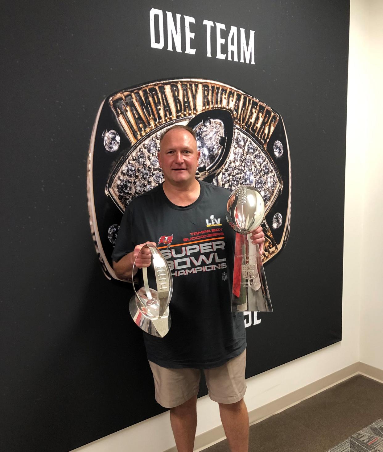 Horseheads native Joe Gilbert, offensive line coach for the Tampa Bay Buccaneers, with Super Bowl hardware before attending the team's boat parade Feb. 10, 2021 in Tampa.