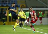 Football Soccer - Inter Milan v Southampton - UEFA Europa League Group Stage - Group K - San Siro Stadium, Milan, Italy - 20/10/16 Inter Milan's Antonio Candreva in action with Southampton's Sam McQueen Reuters / Alessandro Garofalo Livepic