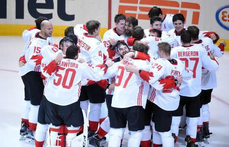 Sep 29, 2016; Toronto, Ontario, Canada; Team Canada players celebrate on the ice after defeating Team Europe 2-1 in game two of the World Cup of Hockey final to win the tournament at Air Canada Centre. Mandatory Credit: Dan Hamilton-USA TODAY Sports