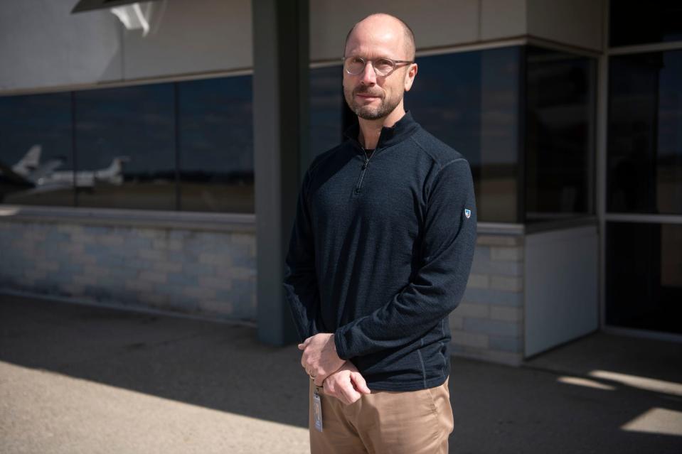 Andy Richards, Executive Vice President and Chief Operating Officer for Duncan Aviation in Battle Creek, stands for a portrait on Monday, March 28, 2022.