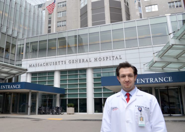 Ihsan Kaadan, MD, originally from Syria, stands in front of Massachusetts General Hospital, where he is a cardiac researcher. (Photo: Courtesy of Ihsan Kaadan)