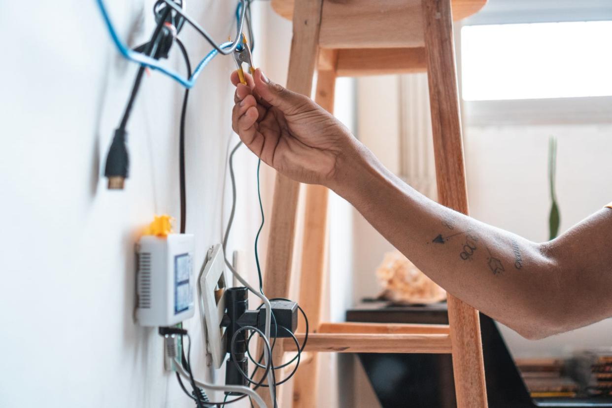 Electrician working home client