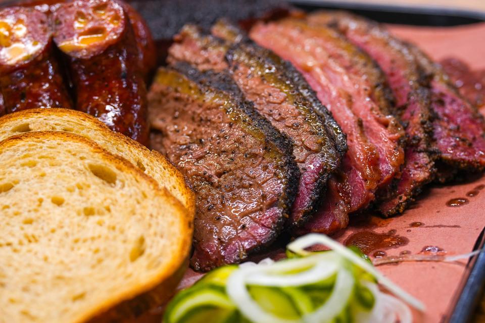 Brisket with a heavily-peppered exterior is served at Mum Foods Smokehouse And Delicatessen on Sunday, Dec. 17, 2023 in Austin. Mum Foods serves what pitmaster Travis Crawford says is traditional North-Central Texas barbecue.