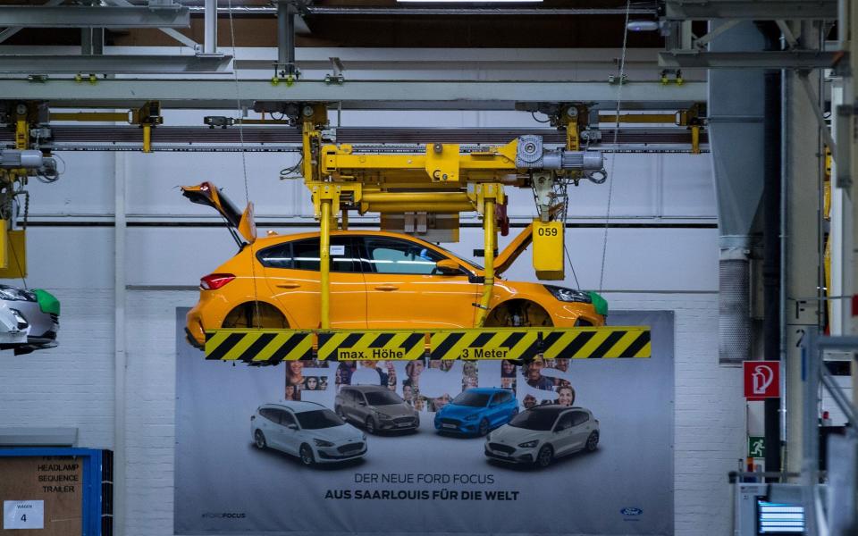 Cradles transport Ford Focus automobile bodies inside the Ford Motor Co. factory in Saarlouis, Germany, on Wednesday, Sept. 25, 2019