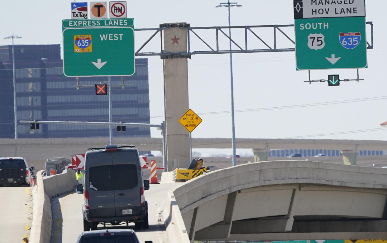 An express lanes highway sign marks an entrance in Dallas, Friday, March 3, 2023. There is growing interest in the South in fee-based express lanes in which some drivers can up to avoid congestion on highways where other drivers can access general lanes for free. (AP Photo/LM Otero)