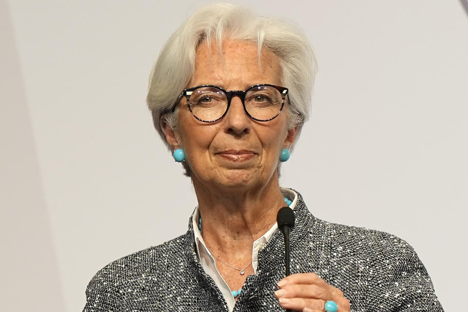 FILE - President of the European Central Bank, Christine Lagarde gives the laudatory speech for former German chancellor Angela Merkel, who is awarded the North Rhine Westphalian State Prize at a ceremony in Cologne, Germany, May 16, 2023. European Central Bank head Christine Lagarde said Monday June 5, 2023, that price pressures are “strong” and made clear that the bank will raise interest rates high enough to bring down inflation and keep them there “for as long as necessary.” (AP Photo/Martin Meissner, File)