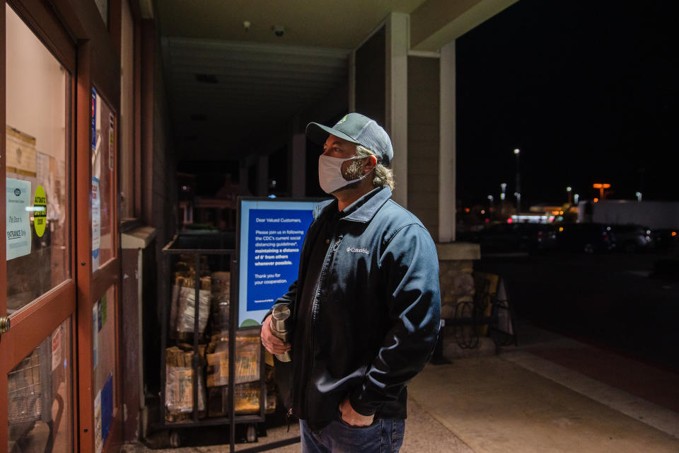 Mike Kurtz, a meat manager at a Ralphs on Carmel Mountain Road in San Diego, waits for an employee to let him in the store at 4 a.m. so he can start his shift. (Photo: Ariana Drehsler for HuffPost)