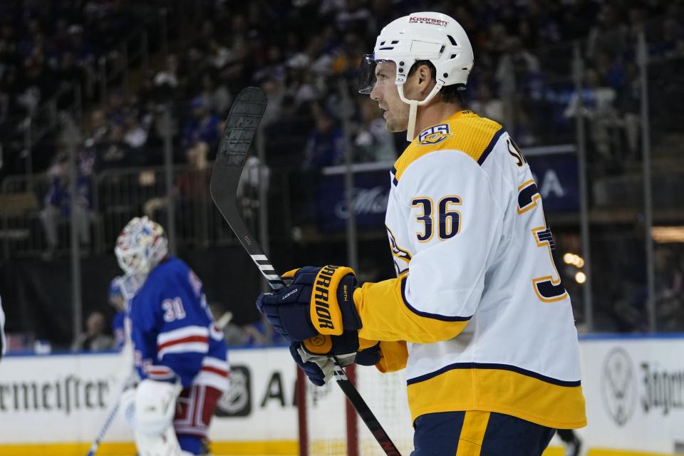 Nashville Predators' Cole Smith (36) skates past New York Rangers goaltender Igor Shesterkin after scoring a goal during the first period of an NHL hockey game Thursday, Oct. 19, 2023, in New York. (AP Photo/Frank Franklin II)