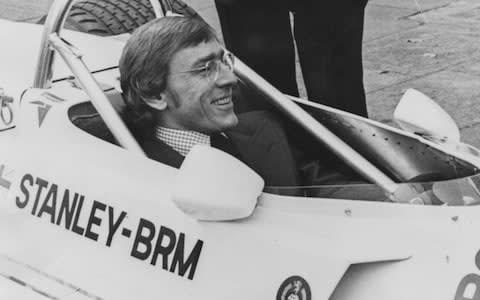 Racing driver Larry Perkins at the wheel of the new Stanley BRM racing car in London - Credit: Hulton Archive