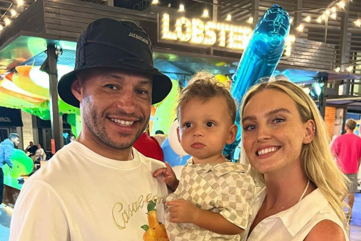 Perrie Edwards pictured with Alex Oxlade-Chamberlain and their son Axel (Instagram @perrieedwards)