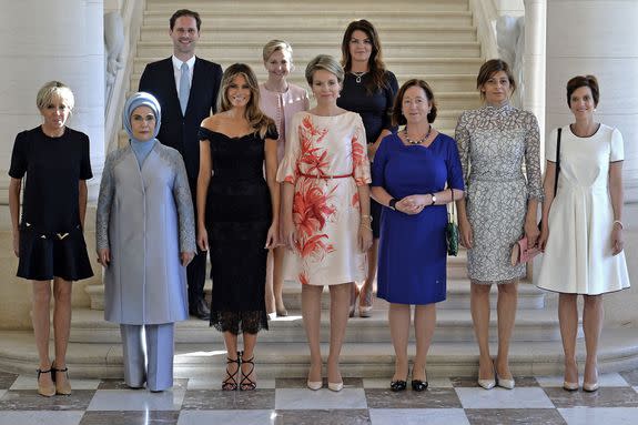 (Front row, L-R) First Lady of France Brigitte Macron, First Lady of Turkey Emine Gulbaran Erdogan, First Lady of the US Melania Trump, Queen Mathilde of Belgium, NATO Secretary General Stoltenberg's partner Ingrid Schulerud, Partner of Bulgaria's President Desislava Radeva, Belgian Prime Minister Michel's partner Amelie Derbaudrenghien, (back row, L-R) First Gentleman of Luxembourg Gauthier Destenay, Slovenia's Prime Minister's partner Mojca Stropnik and First Lady of Iceland Thora Margret Baldvinsdottir.