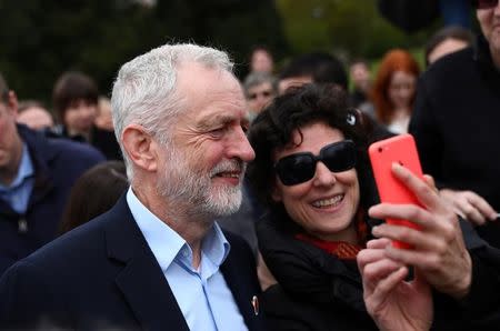 Jeremy Corbyn the leader of Britain's opposition Labour Party poses for self photograph during a campaign event in Harlow, Essex, April 27, 2017. REUTERS/Neil Hall