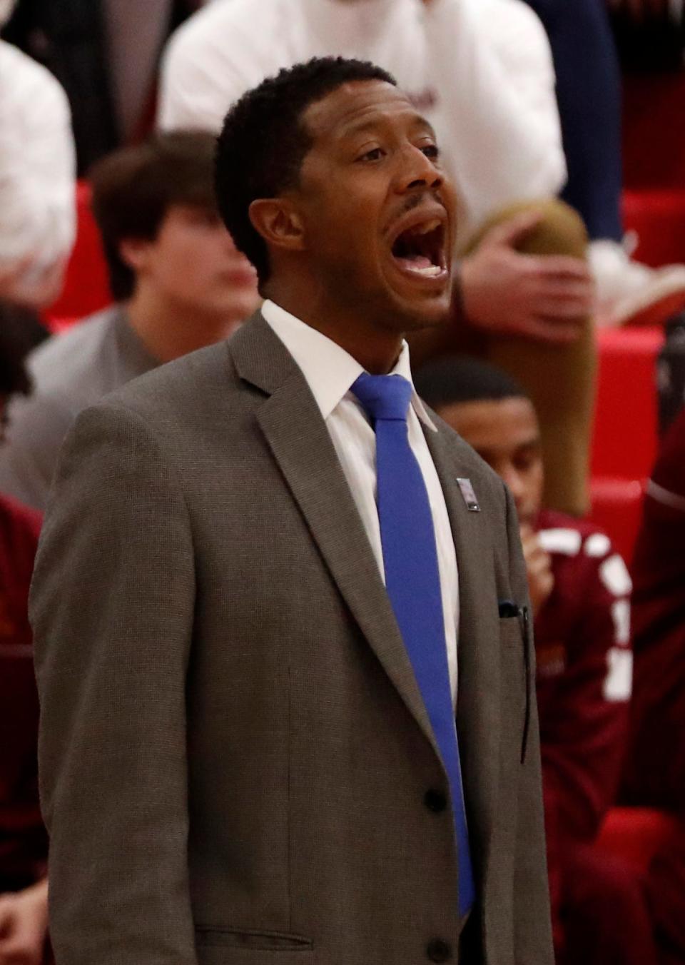 Heritage Christian Eagles head coach Warren Wallace shouts down court during the IHSAA boys basketball sectional 42 game against the Park Tudor Panthers, Tuesday, March 1, 2022, at Park Tudor High School in Indianapolis. 