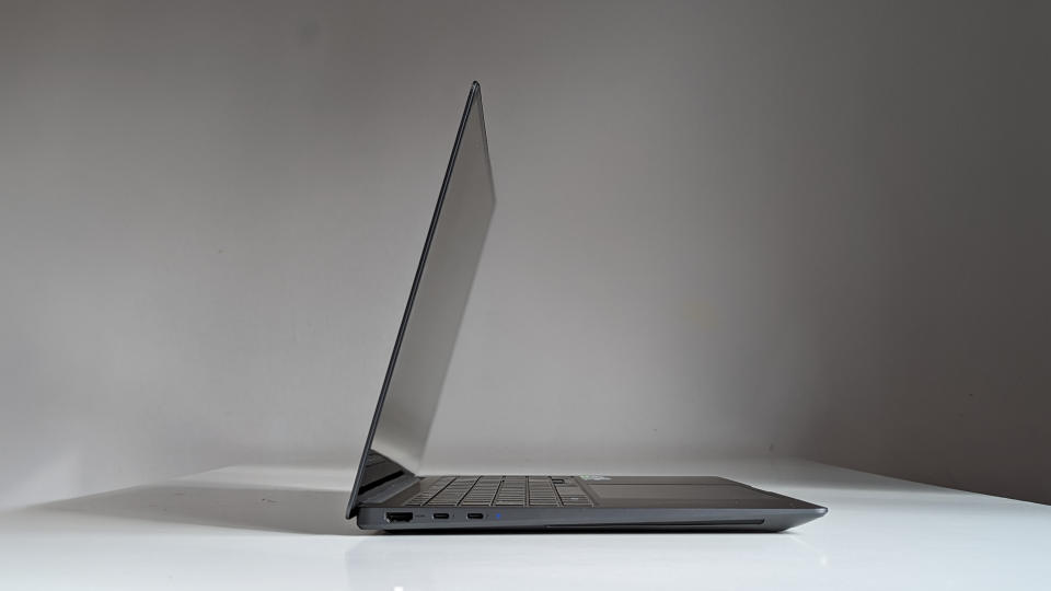 The side view of a Samsung Galaxy Book3 Ultra on a white desk