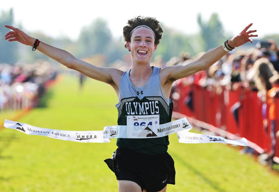 JoJo Jourdon of Olympus wins the boys 5A cross-country state championship race at the Regional Athletic Complex in Rose Park on Tuesday, Oct. 24, 2023.