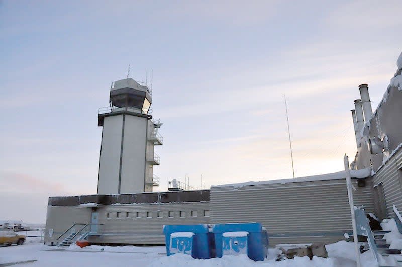 The Inuvik airport in the winter. In a news release, the territorial government is telling drivers to move any vehicles that have been left at the airport for over a three month span. (CBC - image credit)