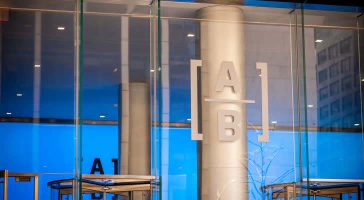 The AllianceBernstein (AB) logo inside a corporate office in New York City.