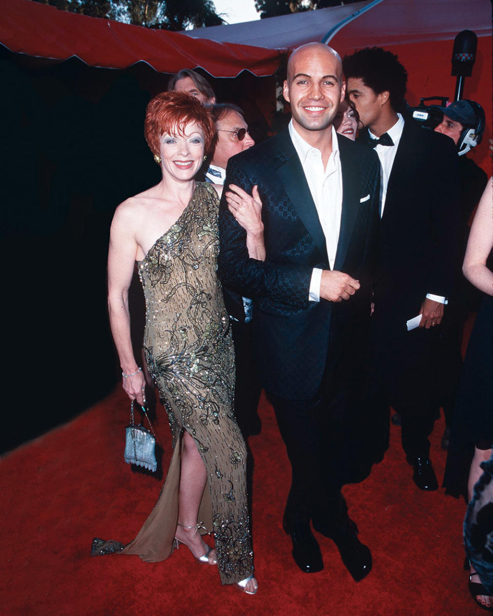 Titanic stars Frances Fisher and Billy Zane arrived at the Shrine Auditorium in Los Angeles. Of Titanic’s 15 weeks as the No. 1 box office grosser, Fisher says, “That is never going to happen again.”