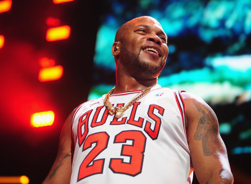 Flo Rida performs onstage during 103.5 KISS FM’s Jingle Ball 2013, presented by Jam Audio Collection, at United Center on December 9, 2013 in Chicago, IL. .