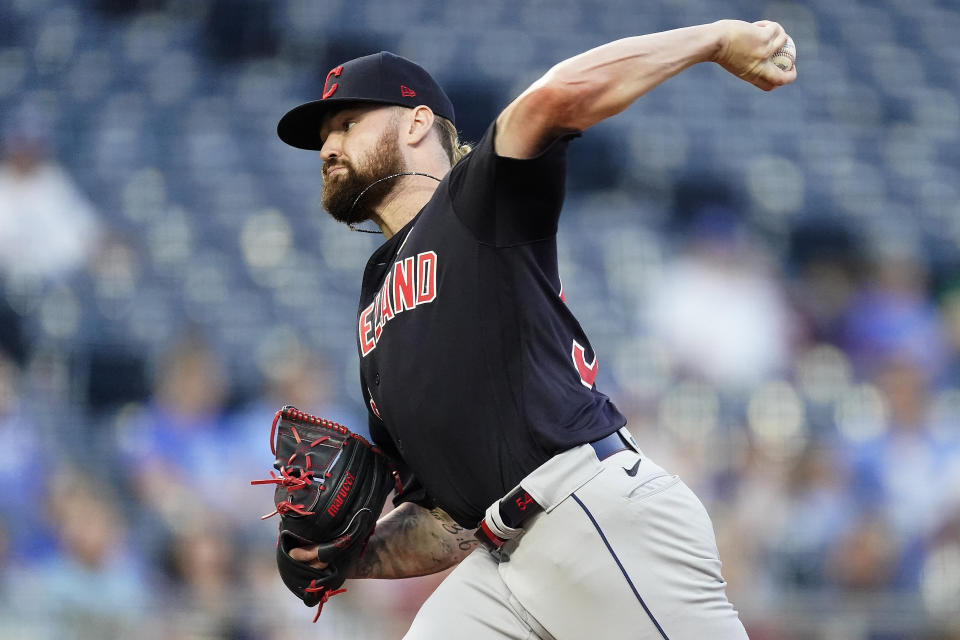 Cleveland Indians starting pitcher Logan Allen throws during the first inning of a baseball game against the Kansas City Royals Wednesday, Sept. 1, 2021, in Kansas City, Mo. (AP Photo/Charlie Riedel)