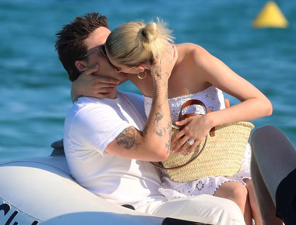 <p>Brooklyn Beckham and Nicola Peltz share a kiss during their getaway to Saint-Tropez, France, on July 14. </p>