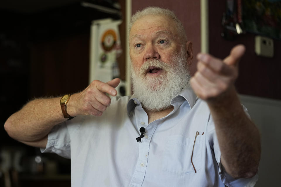 Dean Kahler, who was shot and paralyzed at Kent State University on May 4, 1970, recounts the National Guard aiming their rifles that day, during an interview in his home Thursday, May 2, 2024, in Plain Township, Ohio. (AP Photo/Sue Ogrocki)