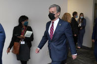 FBI Director Christopher Wray arrives for a news conference, Wednesday, Aug. 10, 2022, in Omaha, Neb. (AP Photo/Charlie Neibergall)