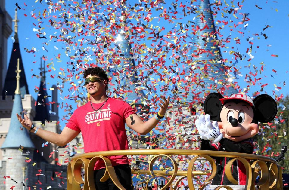 Mickey Mouse with Super Bowl MVP and Kansas City Chiefs quarterback Patrick Mahomes during a parade at the Magic Kingdom in 2020.