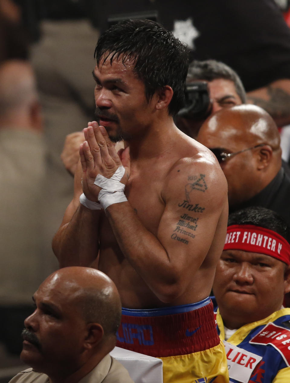 Manny Pacquiao, from the Philippines, greets fans after his welterweight title against Floyd Mayweather Jr., on Saturday, May 2, 2015 in Las Vegas. (AP Photo/Eric Jamison)