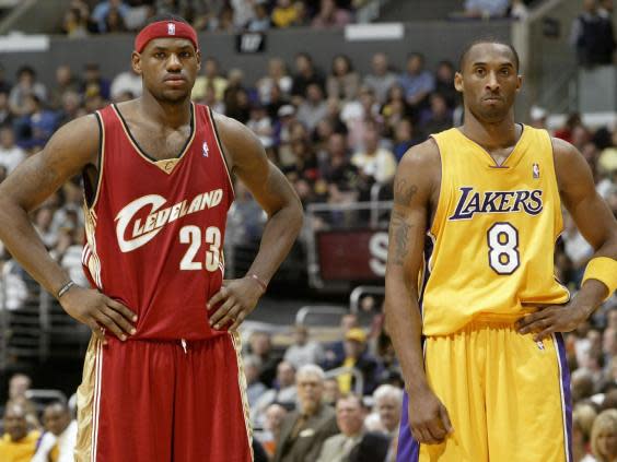 LeBron James and Kobe Bryant during a Cavaliers vs Lakers game (Getty)