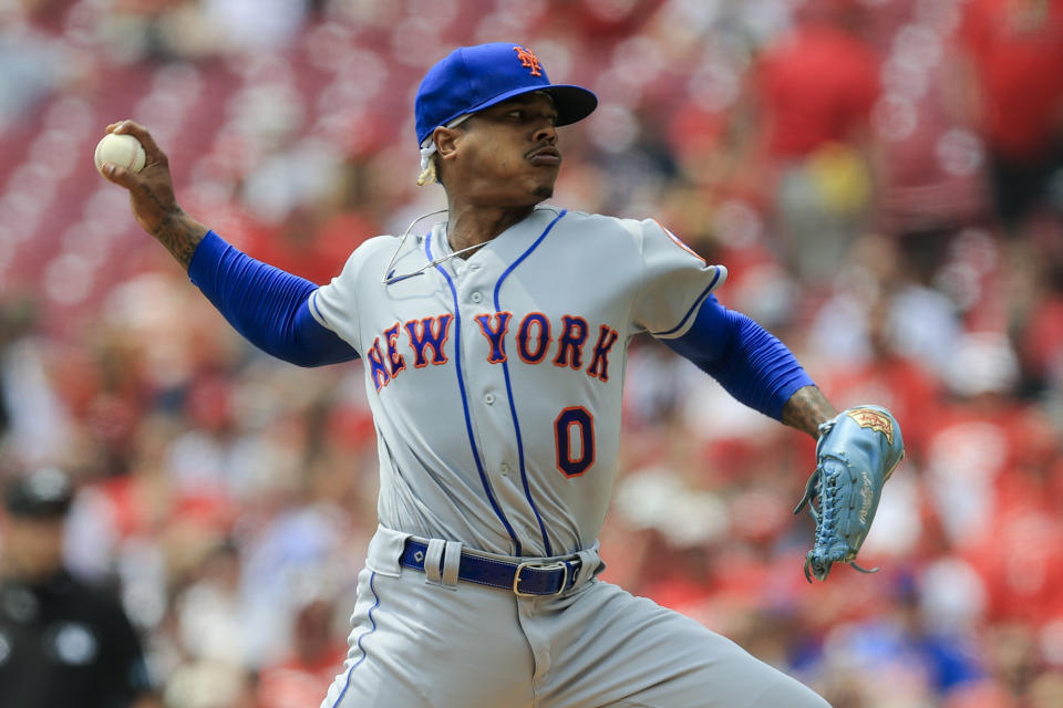 New York Mets' Marcus Stroman throws during the first inning of a baseball game against the Cincinnati Reds in Cincinnati, Wednesday, July 21, 2021. (AP Photo/Aaron Doster)