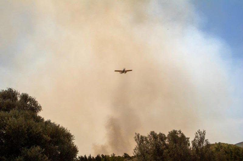 Firefighting aircraft were drafted in from at least three neighbouring countries as authorities scrambled to bring wildfires under control and prevent them reaching built up areas. File photo by Damianidis Lefteris/EPA-EFE