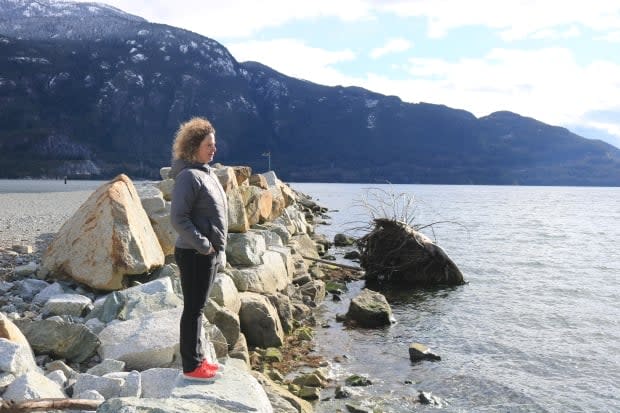 Nikki Layton stands at the south end of the Squamish Spit on a windy February afternoon.