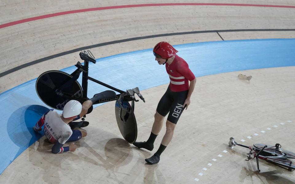 Frederik Madsen (R) of Denmark reacts after crashed with Charlie Tanfield (L) of Great Britain during the Men's Team Pursuit first round during the Track Cycling events of the Tokyo 2020 Olympic Games at the Izu Velodrome in Ono, Shizuoka, Japan, 03 August 2021. - CHRISTOPHER JUE/EPA-EFE/Shutterstock