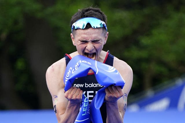 Alex Yee celebrates winning the World Triathlon Series event in Leeds