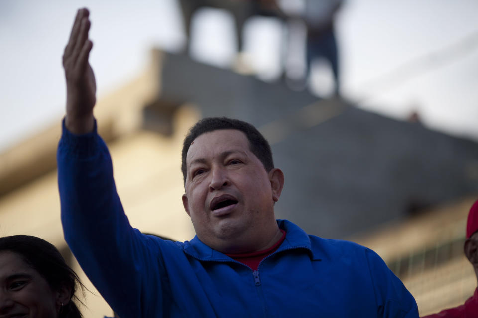 Venezuela's President Hugo Chavez waves to supporters during a campaign rally in Barquisimeto, Venezuela, Tuesday, Oct. 2, 2012. Chavez will run for re-election against opposition candidate Henrique Capriles on Oct. 7. (AP Photo/Rodrigo Abd)