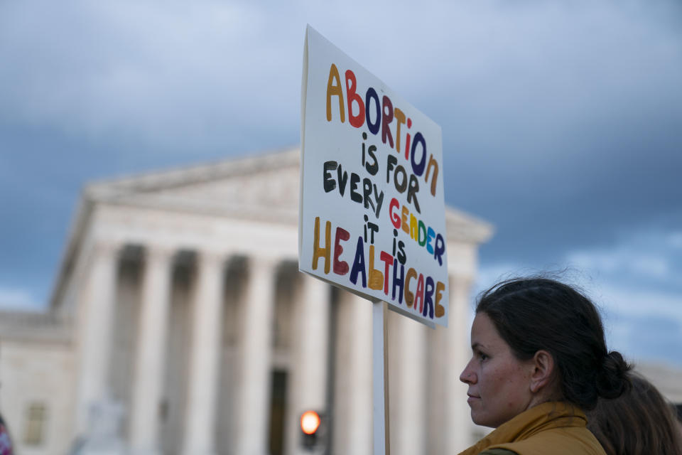 WASHINGTON, DC - MAY 04: Abortion-rights advocates demonstrate in front of the U.S. Supreme Court Building on May 4, 2022 in Washington, DC.  Demonstrations across the country continue as abortion-rights and anti-abortion advocates react to the leaked initial draft majority opinion indicating the U.S. Supreme Court would overturn two abortion-related cases, which would end federal protection of abortion rights. (Photo by Sarah Silbiger/Getty Images)