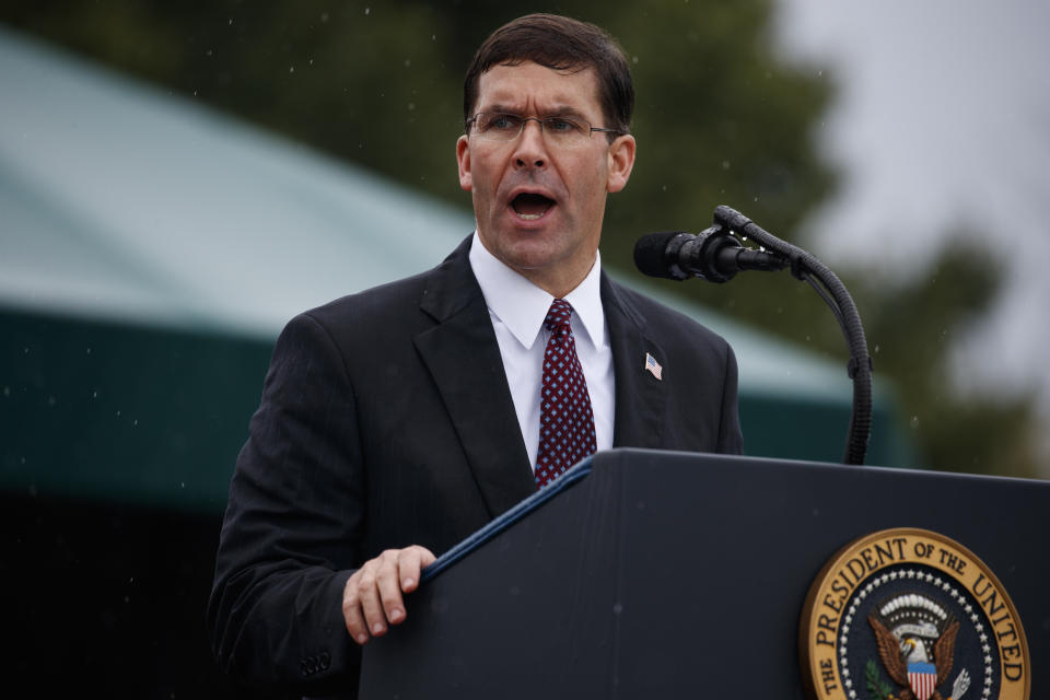 Defense Secretary Mark Esper speaks during an Armed Forces welcome ceremony for the new chairman of the Joint Chiefs of Staff, Gen. Mark Milley, Monday, Sept. 30, 2019, at Joint Base Myer-Henderson Hall, Va. (AP Photo/Evan Vucci)