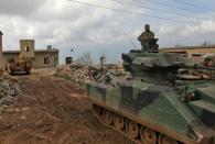 Turkish forces and army helicopters advance towards the village of Al-Maabatli in the Afrin region in the northwestern Aleppo province countryside as part of the ongoing offensive on March 2, 2018