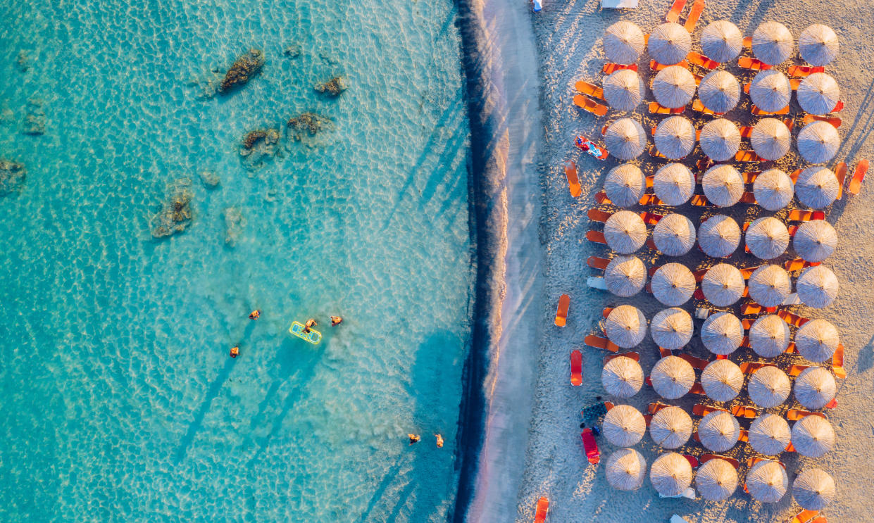 The beautiful beach at Elafonissi in Crete is famous for its soft pink sand. (Getty Images)