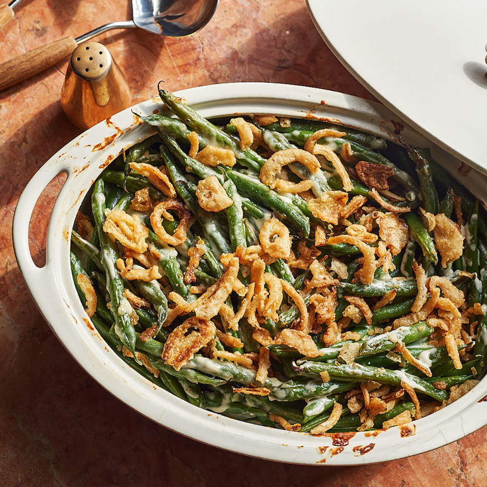 <p>If green bean casserole is a must-have in your family at Thanksgiving but you're, well, ready for a change, give this cheesy version a whirl. <a href="https://www.eatingwell.com/recipe/7869824/cheesy-green-bean-casserole/" rel="nofollow noopener" target="_blank" data-ylk="slk:View Recipe;elm:context_link;itc:0;sec:content-canvas" class="link ">View Recipe</a></p>