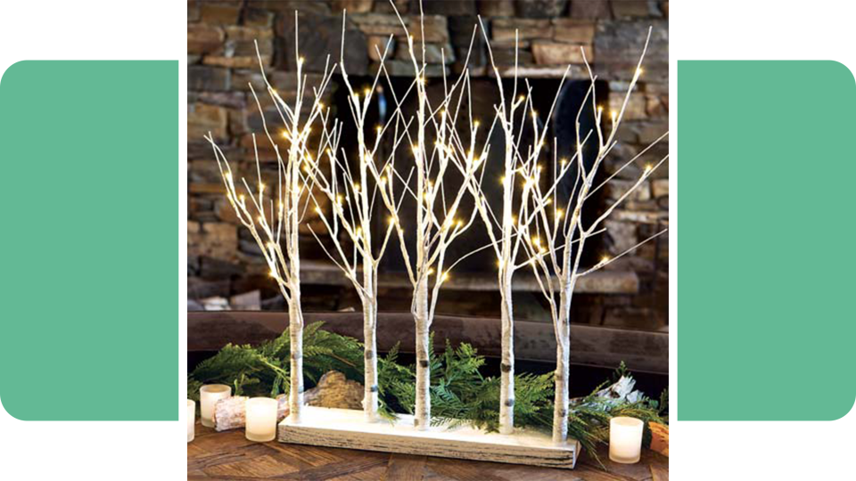 winter wedding essentials: lit tree lighting
