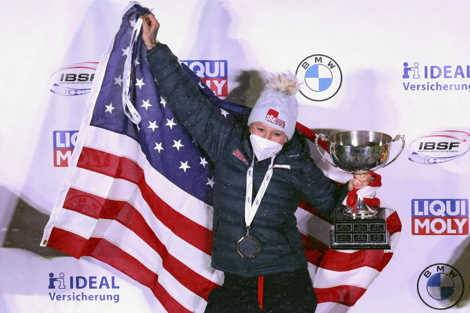 Kaillie Humphries of the United States celebrate after winning with Lolo Jones the two women's bobsleigh race at the Bobsleigh and Skeleton World Championships in Altenberg, Germany, Saturday, Feb. 6, 2021. (AP Photo/Matthias Schrader)