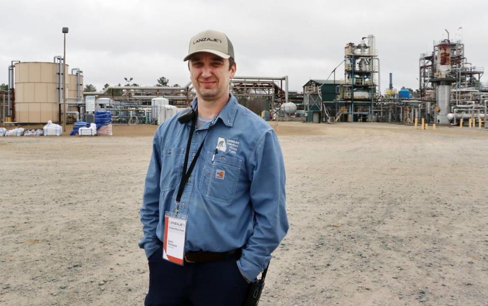Justin Thomason, plant operator lead at Freedom Fuel Pines. He moved from Washington State to Dublin, Georgia to pursue work in SAF after working in oil refineries. He poses in front of part of the Freedom Fuel Pines plant. 01/24/2024